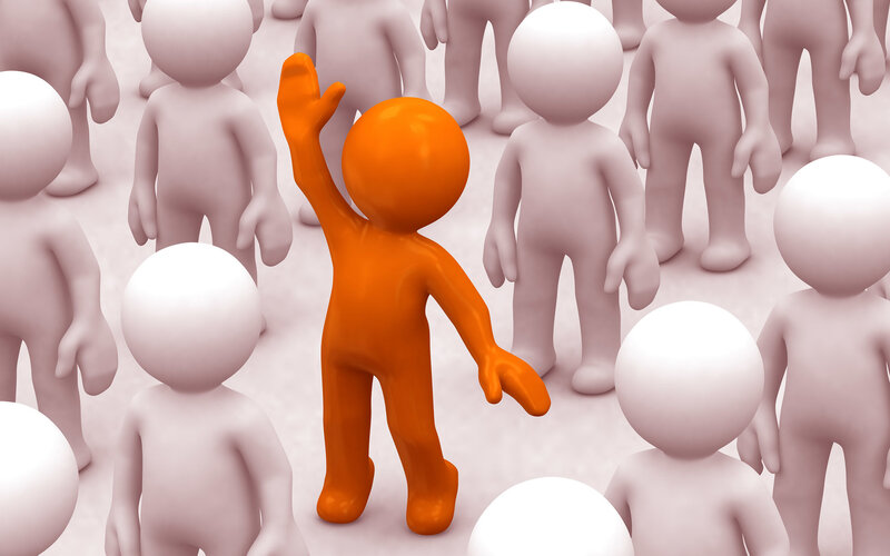 orange figure in crowd