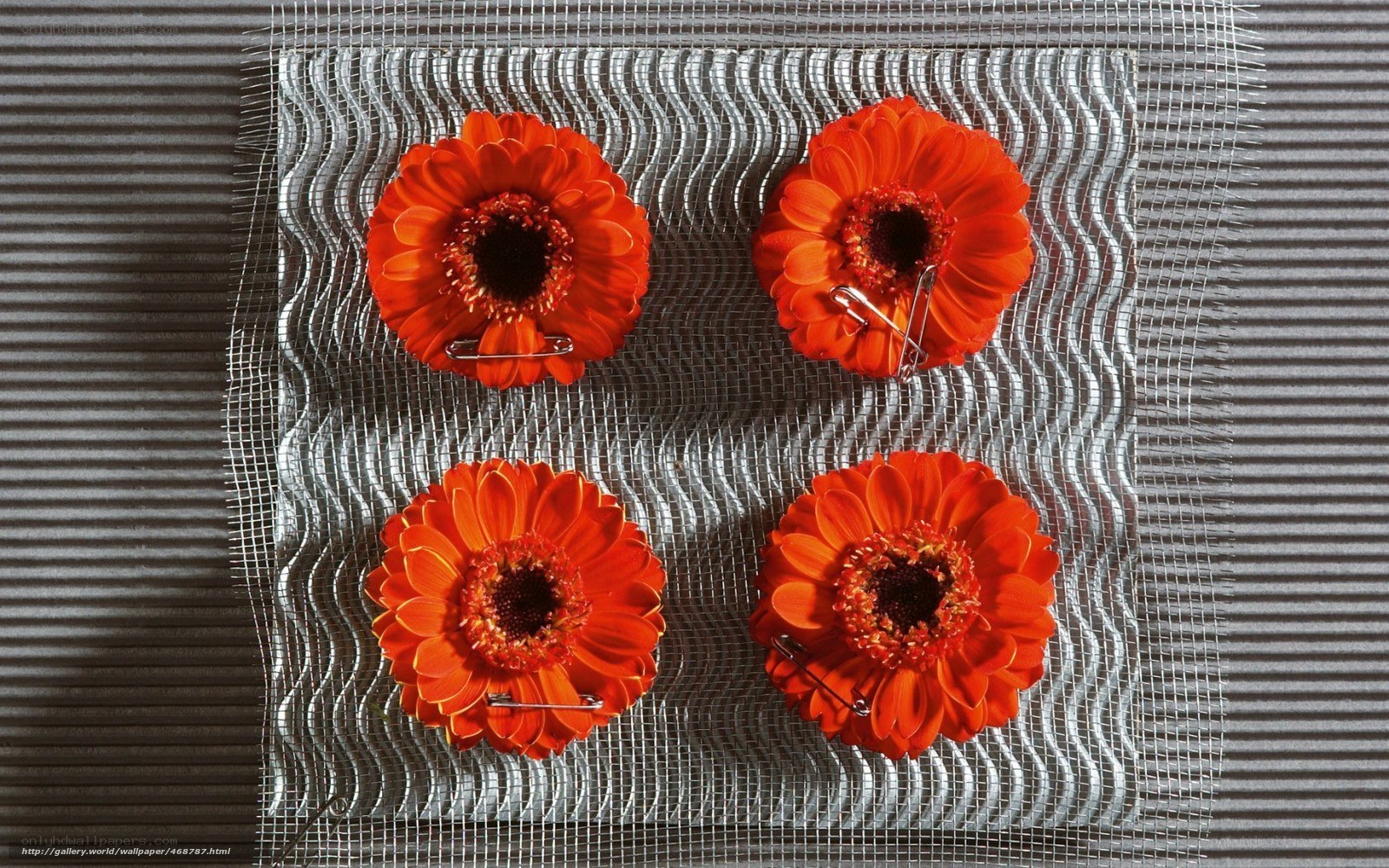 Orange flowers on mesh fabric