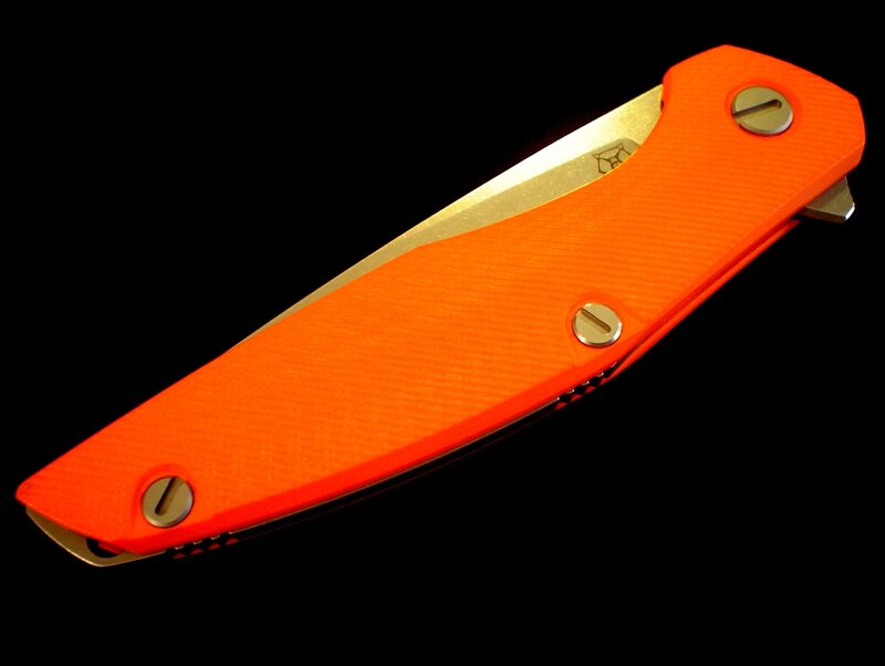 Orange Folding Knife — Dramatic