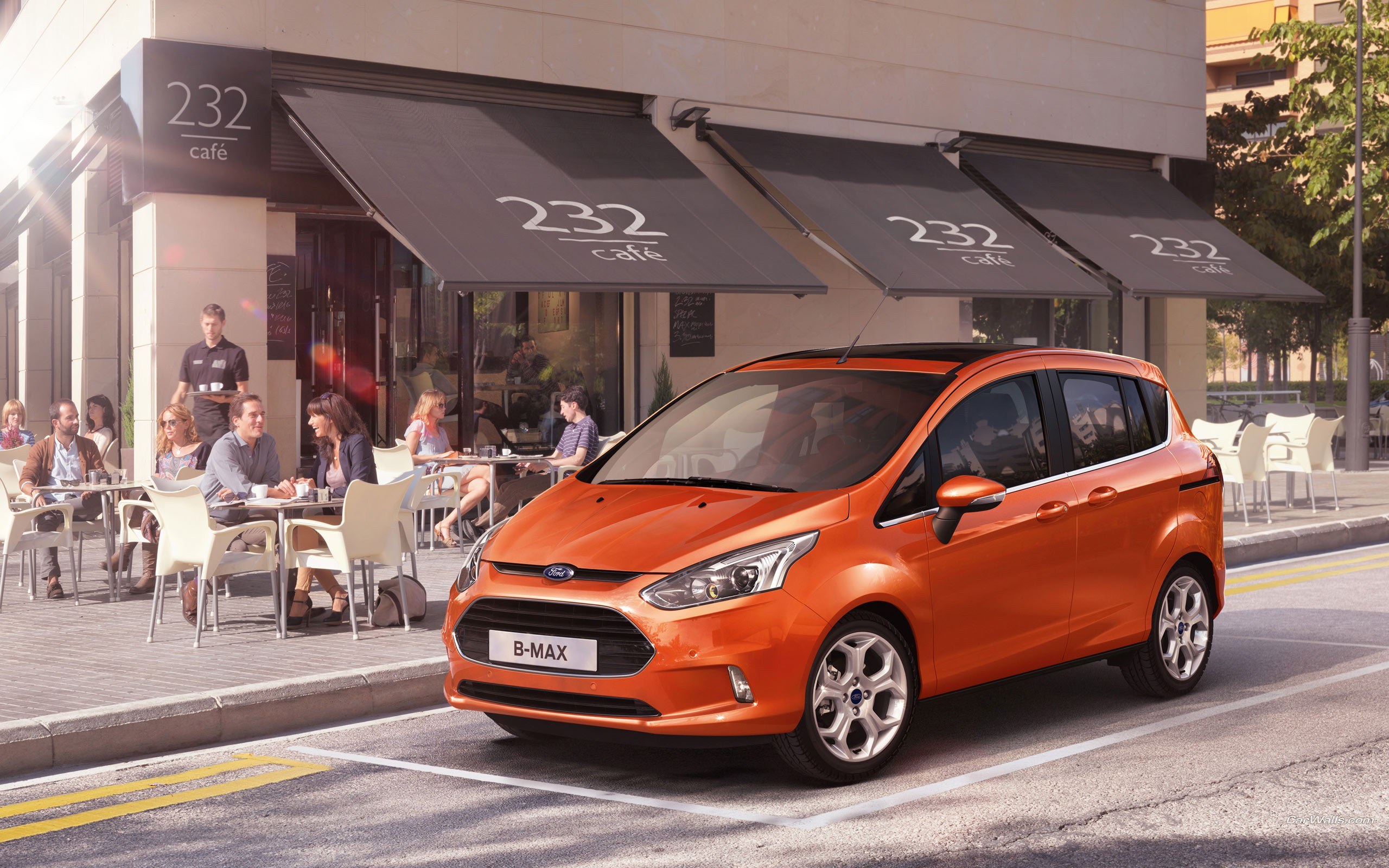Orange Ford B-MAX in city