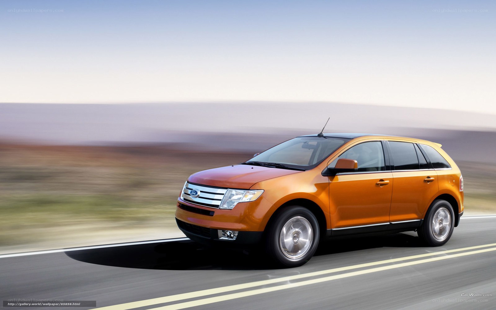 Orange Ford Edge on a road