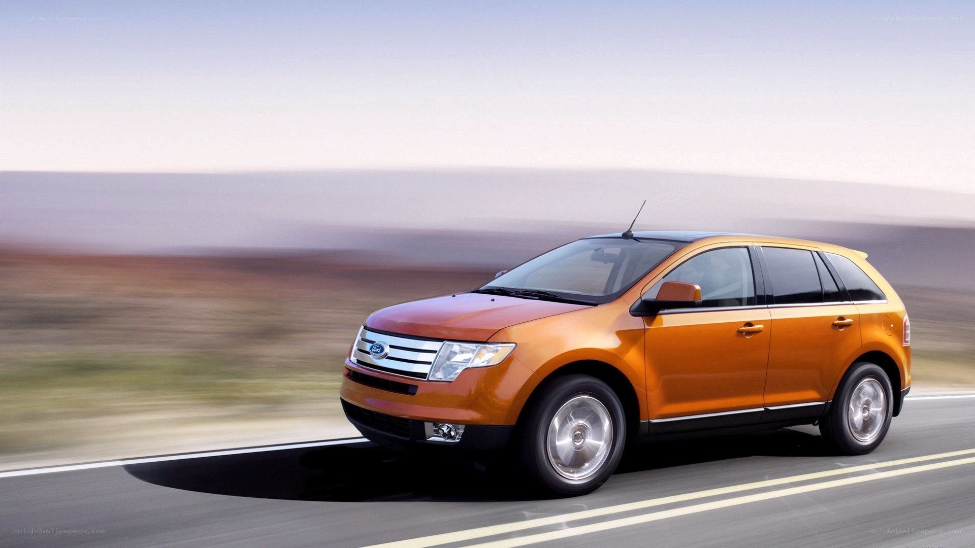 Orange Ford Escape in motion