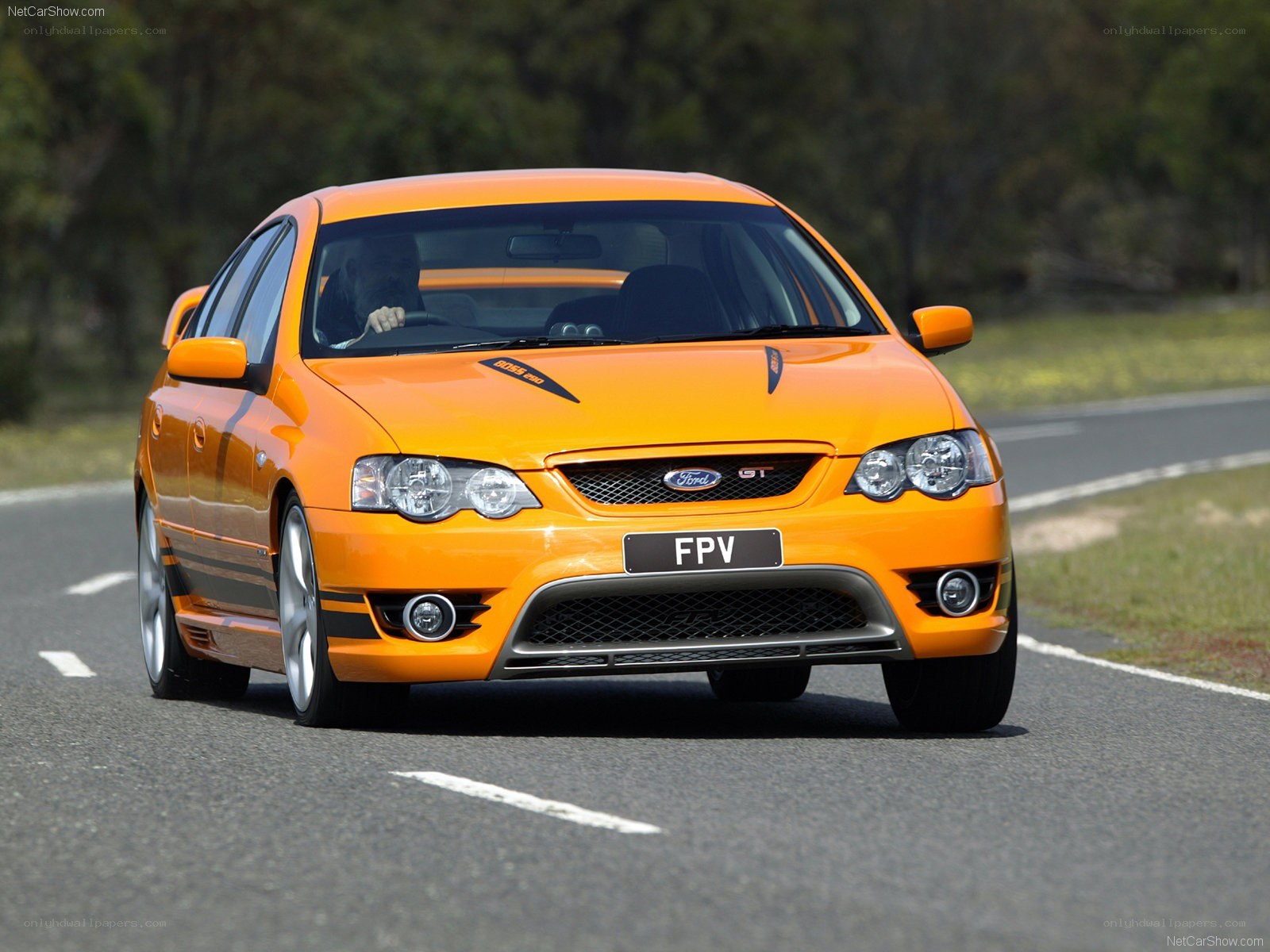 orange ford falcon gt in motion