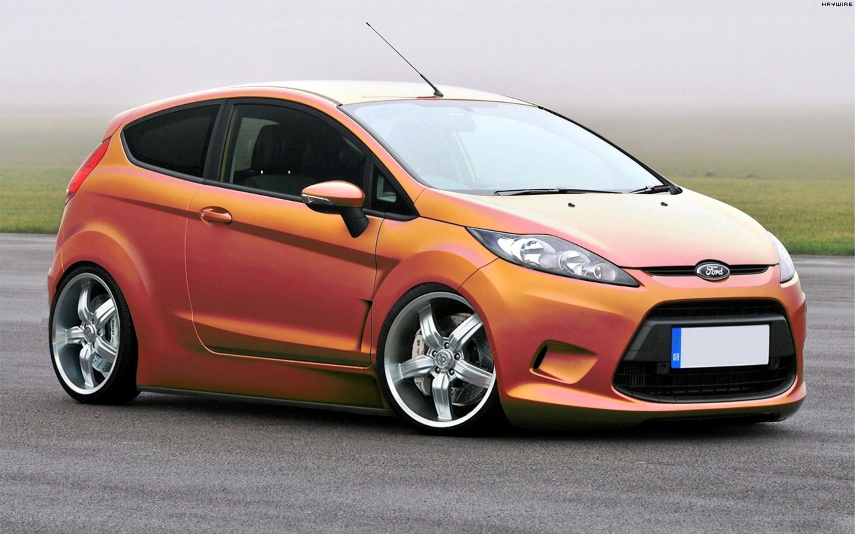 orange Ford Fiesta hatchback
