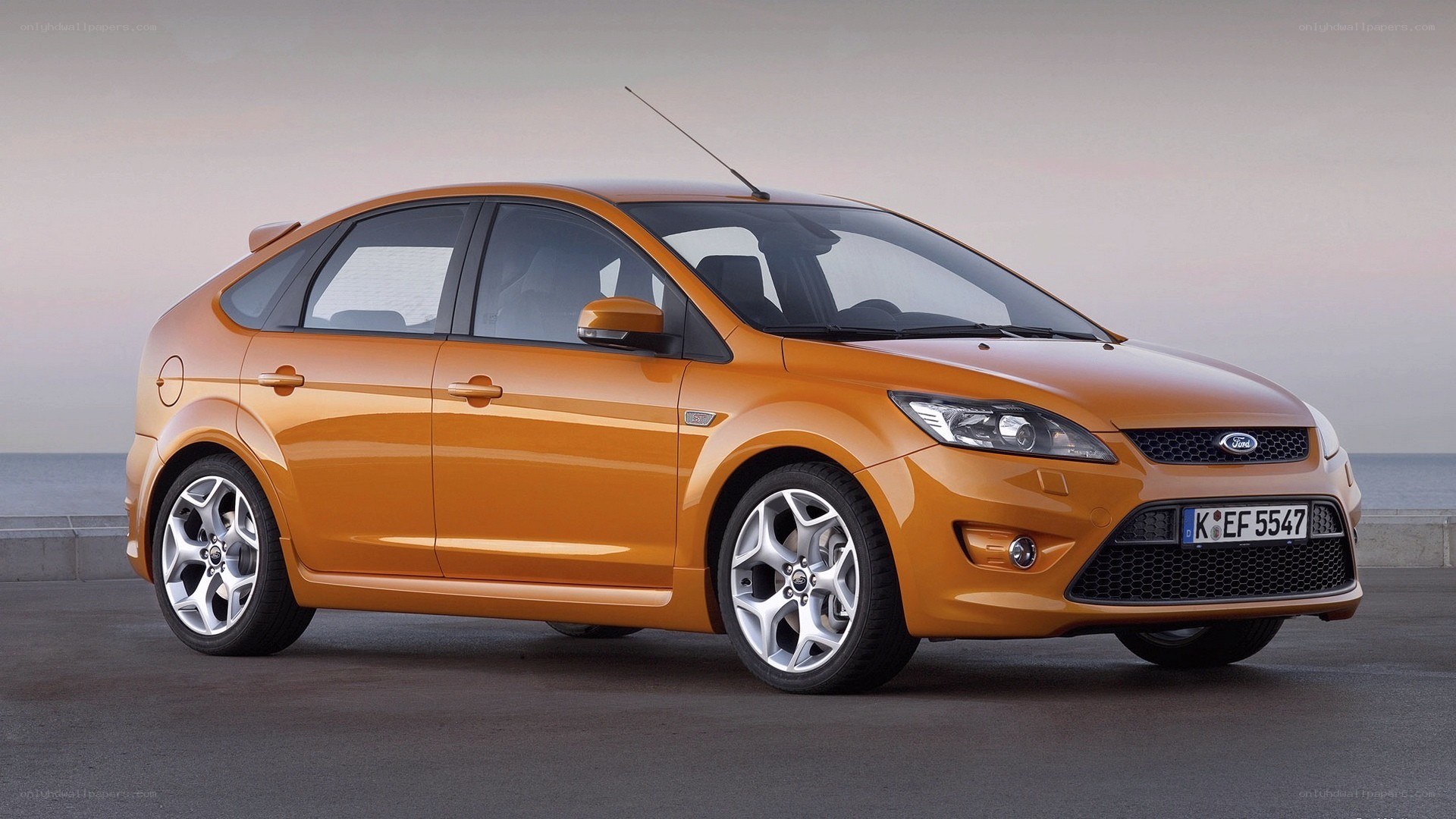 orange Ford Focus hatchback