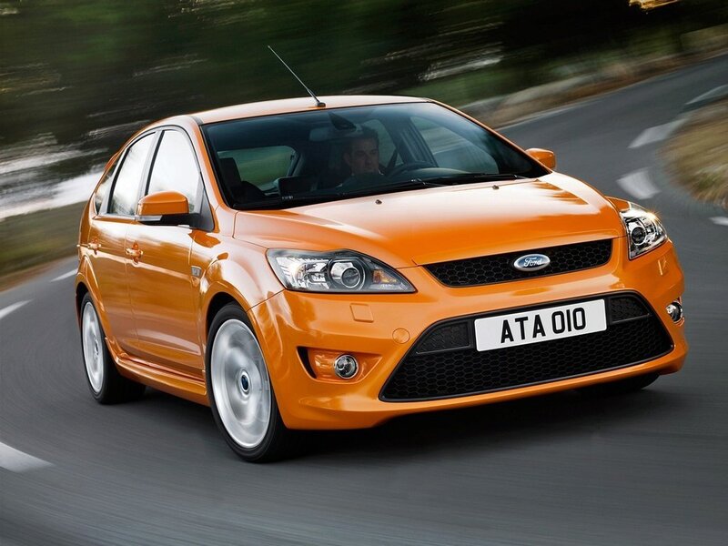 Orange Ford Focus in motion