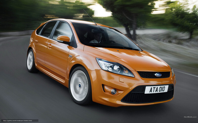orange ford focus in motion