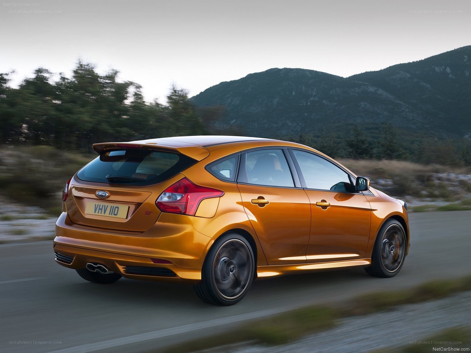 Orange Ford Focus ST in motion