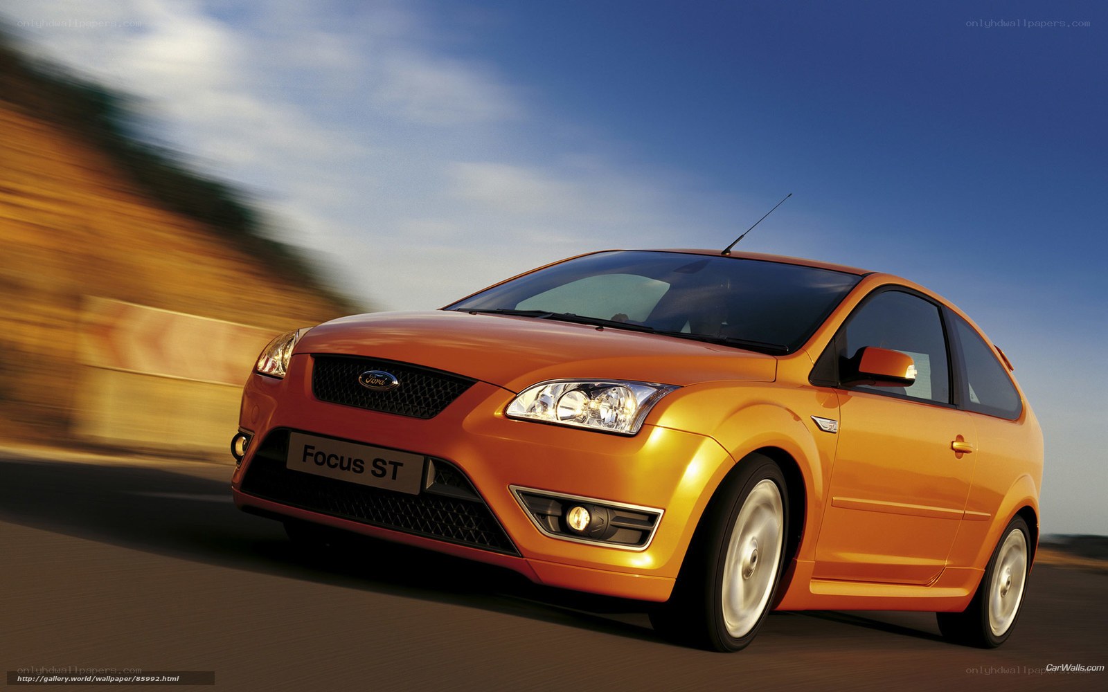 Orange Ford Focus ST in motion