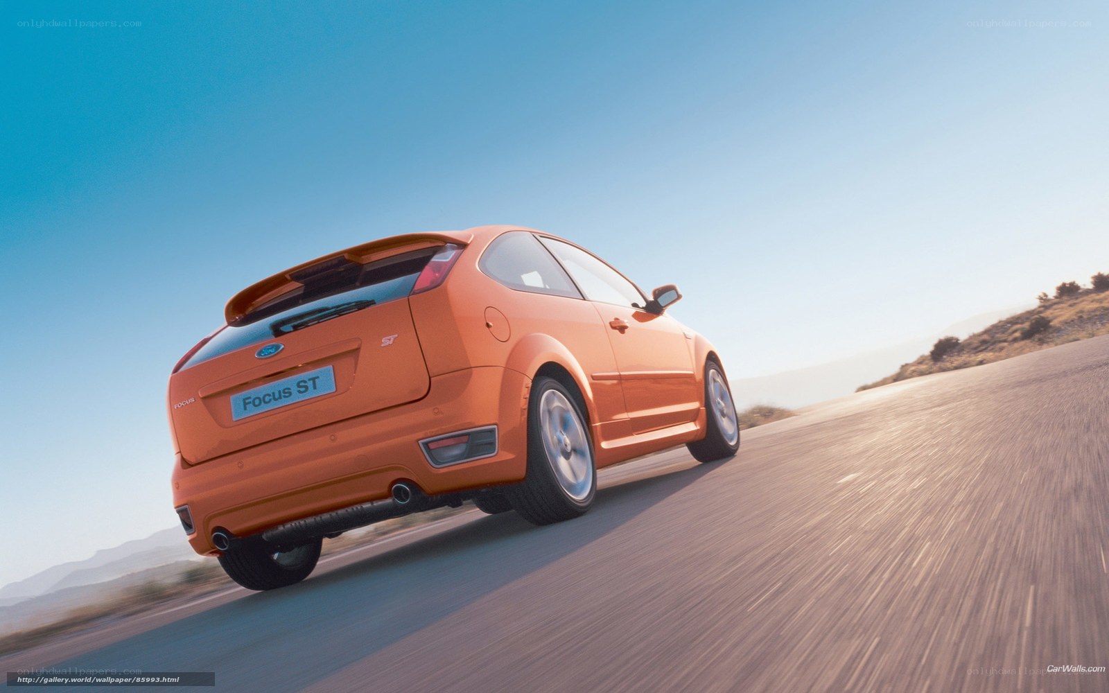 Orange Ford Focus ST on road