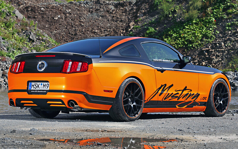 Orange Ford Mustang coupe