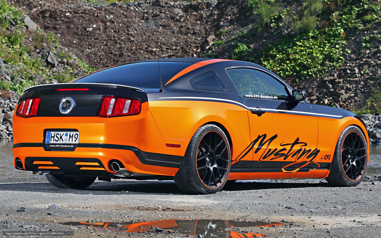 Orange Ford Mustang coupe