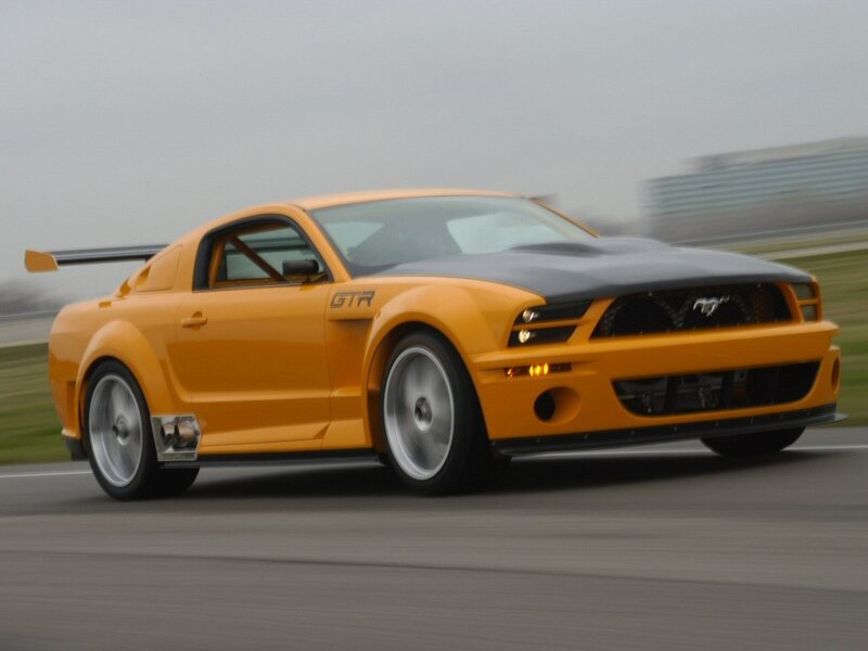 Orange Ford Mustang GTR on track