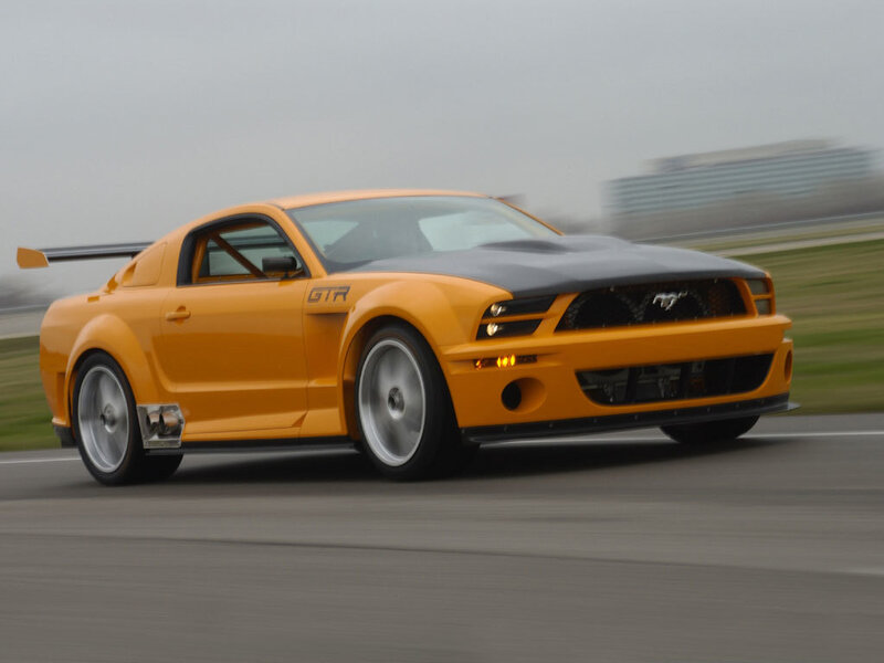 orange Ford Mustang GTR on track