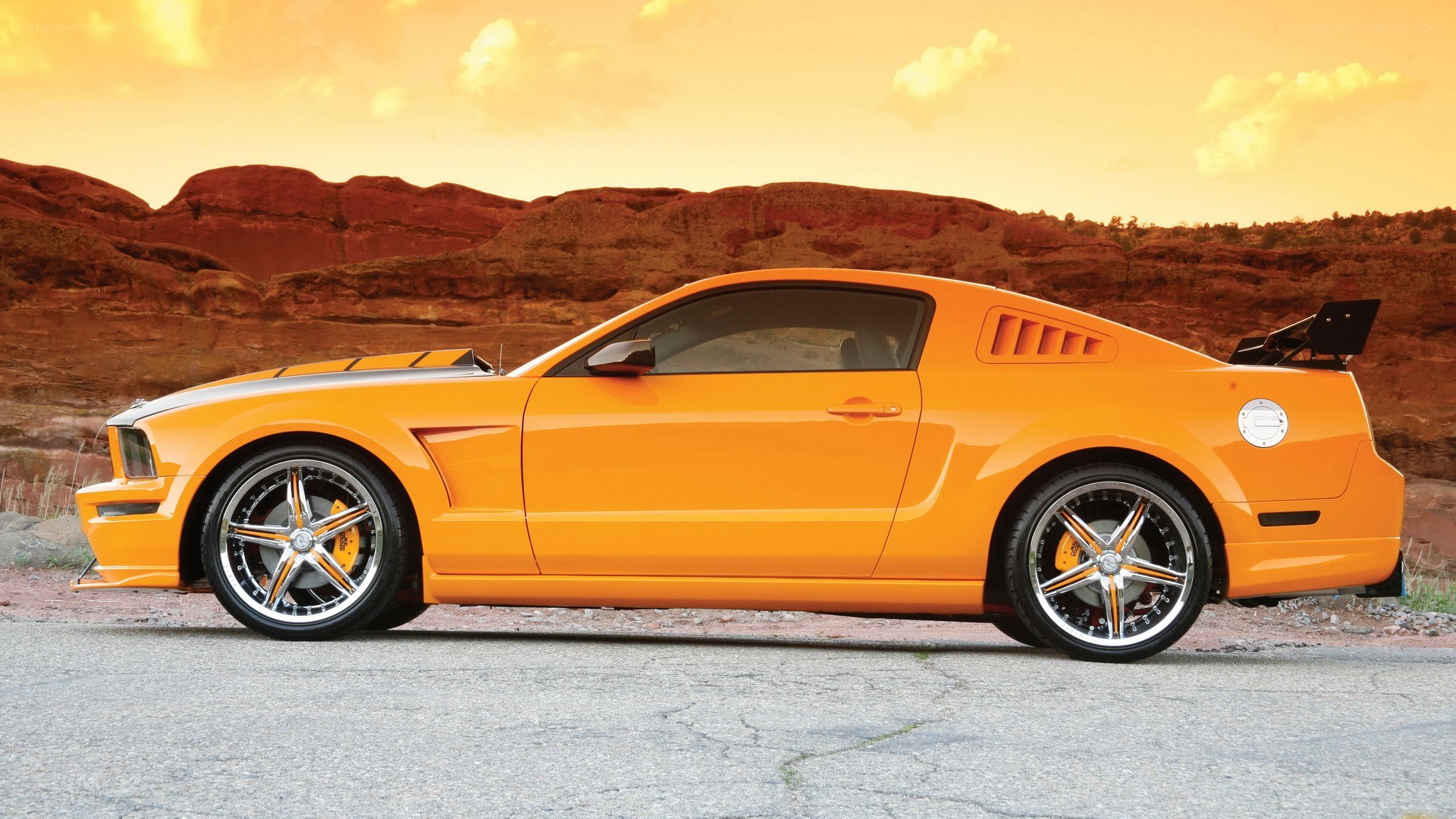 Orange Ford Mustang in desert