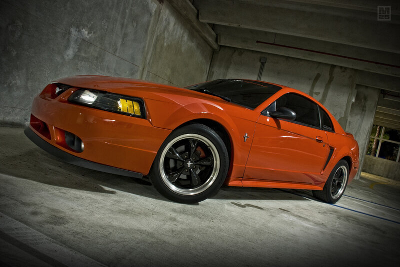 Orange Ford Mustang in Garage