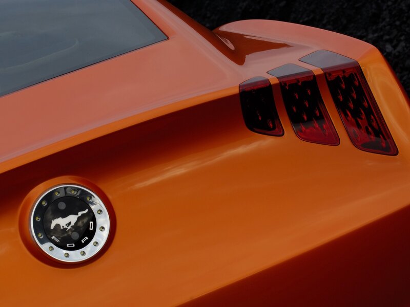 Orange Ford Mustang rear view