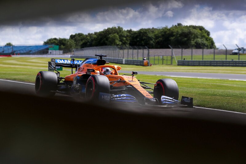 Orange Formula One Car — Dramatic, Afternoon