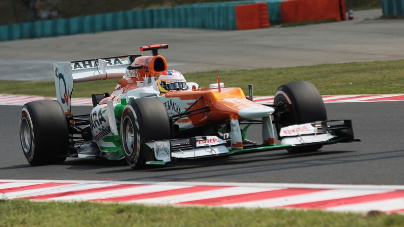 Orange Formula One Car — Dynamic, Afternoon