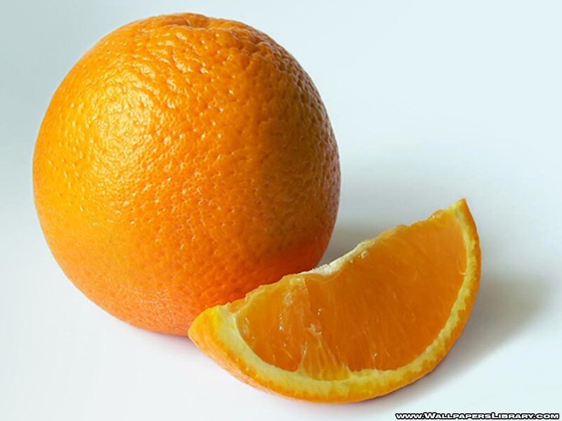 orange fruit with slice