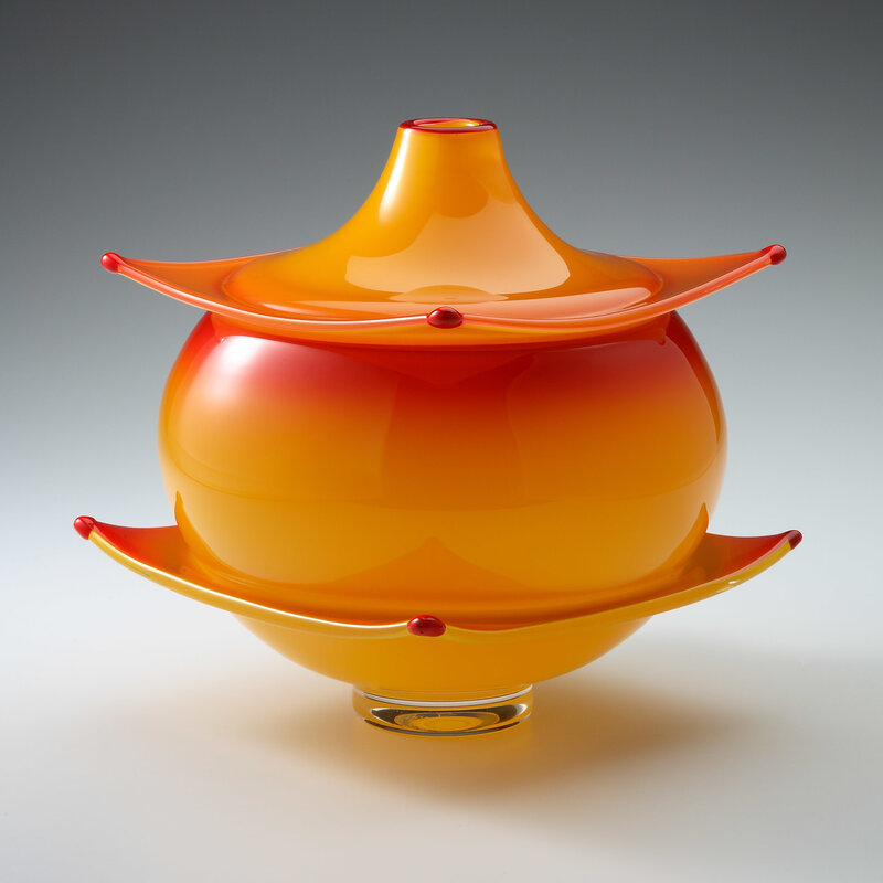 Orange glass sculpture with lid