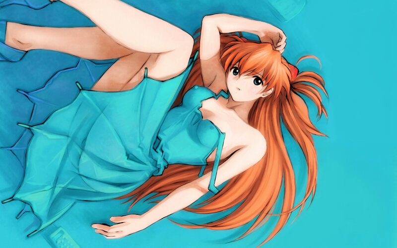 orange-haired girl in blue dress