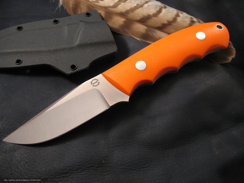 orange-handled knife with sheath