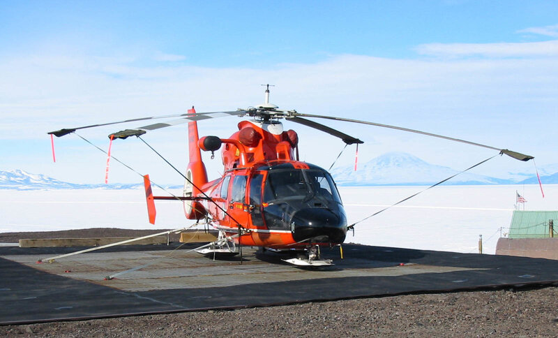 Orange helicopter on ice