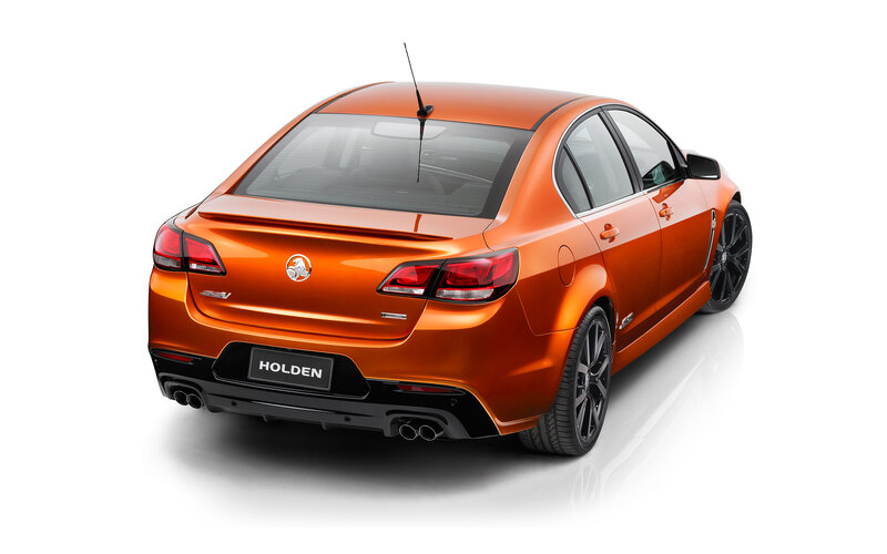 Orange Holden Sedan — Neutral, Photograph