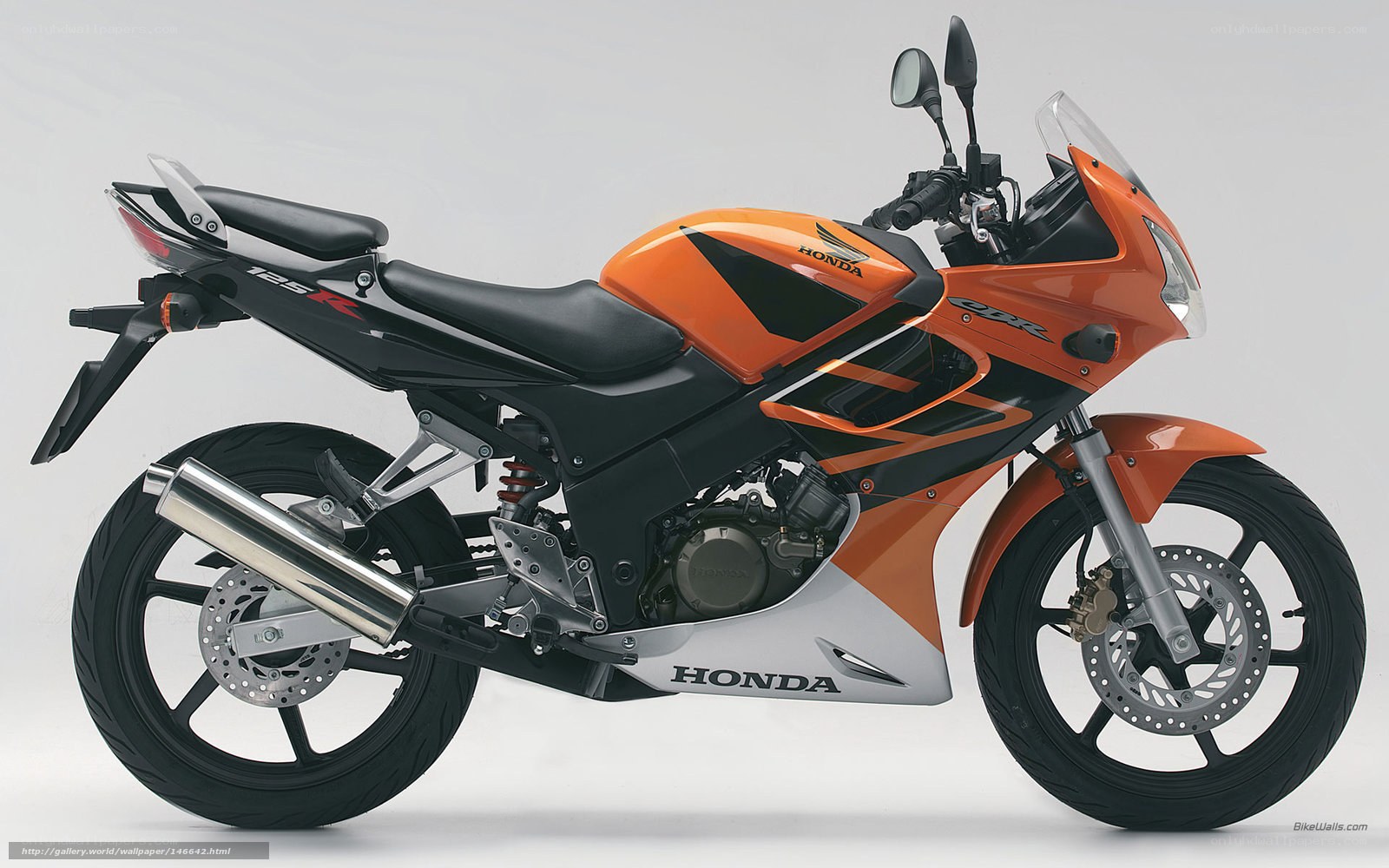 Orange Honda CBR125R motorcycle