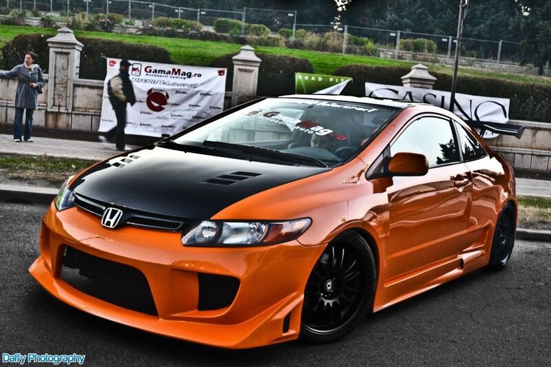 Orange Honda Civic with black hood