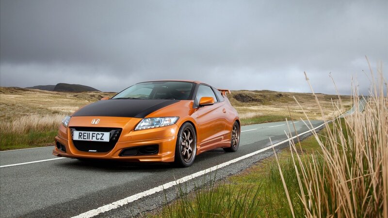 Orange Honda CR-Z on a country road