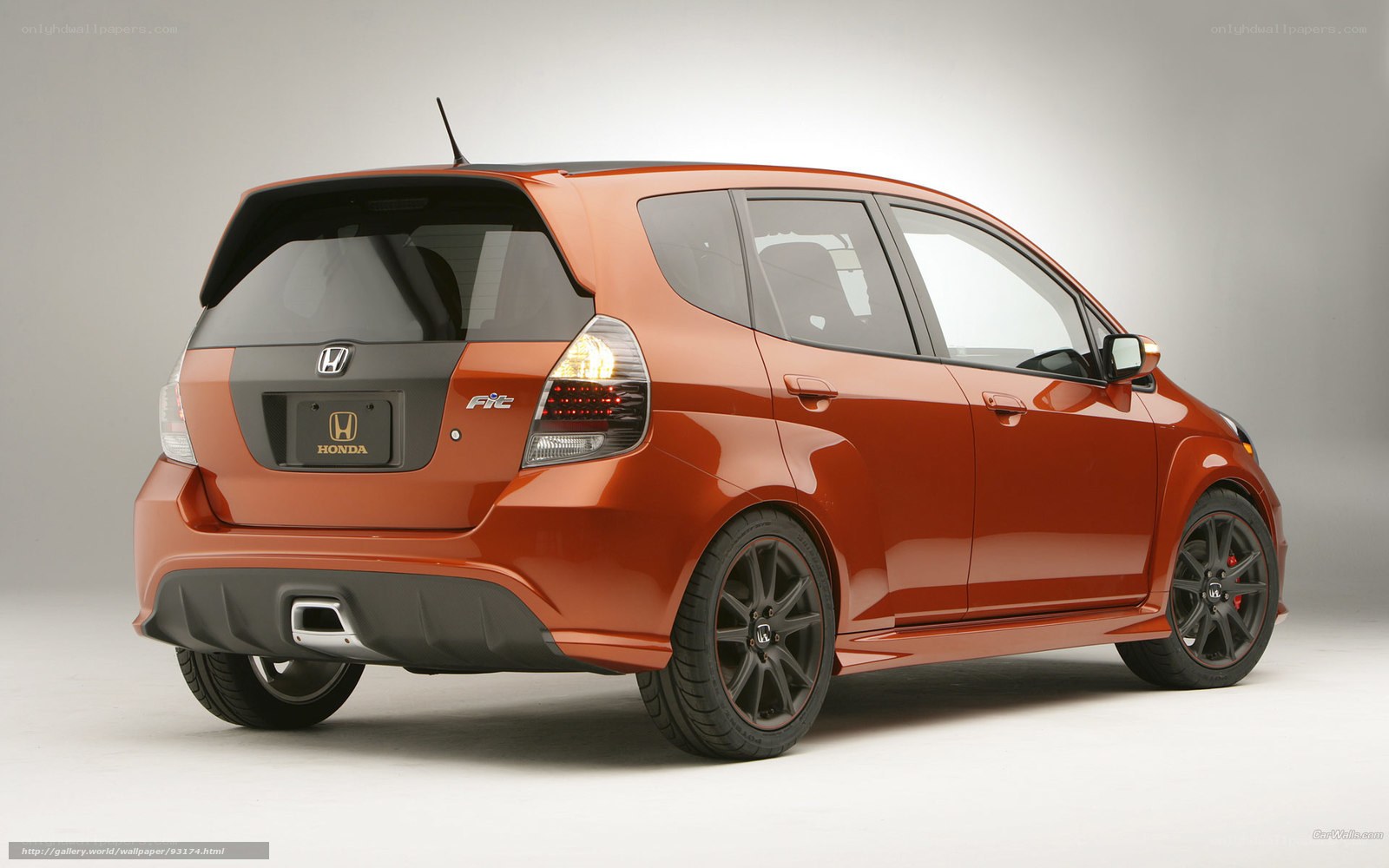 Orange Honda Fit car