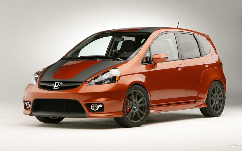 orange honda fit with black stripes