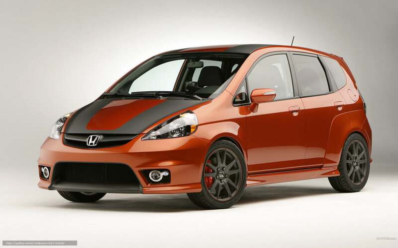 Orange Honda Fit with racing stripes