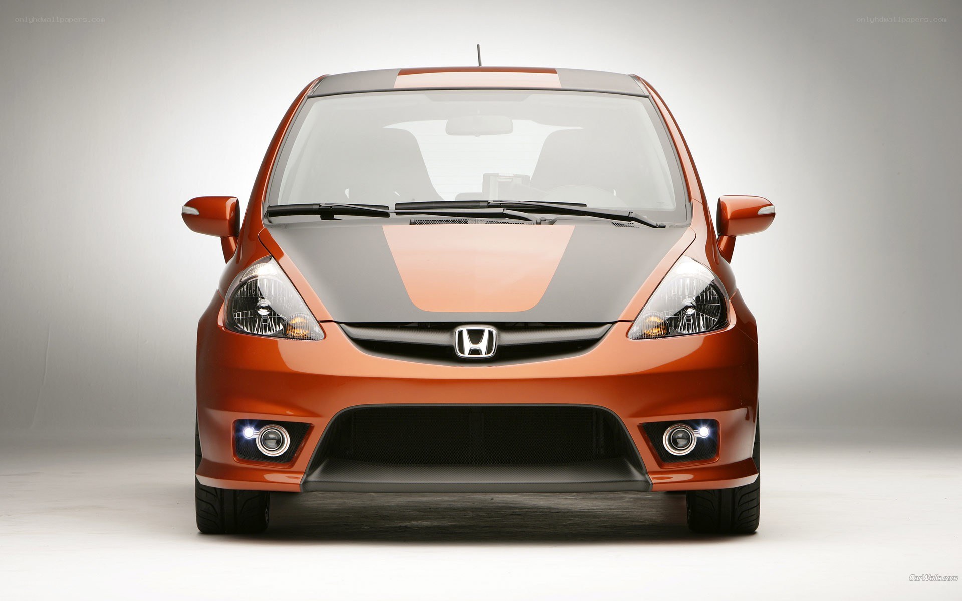 orange honda hatchback car
