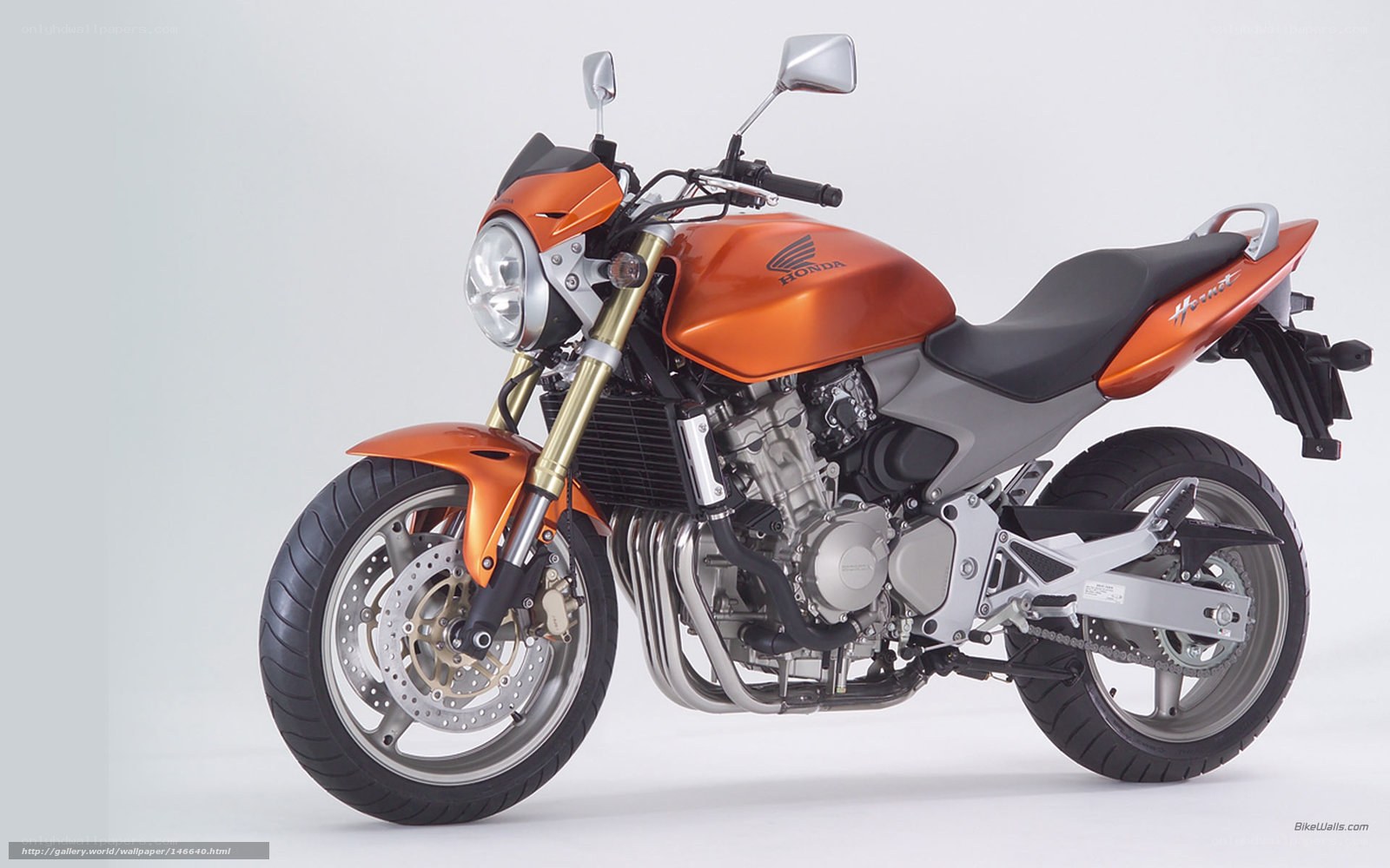 Orange Honda Hornet motorcycle