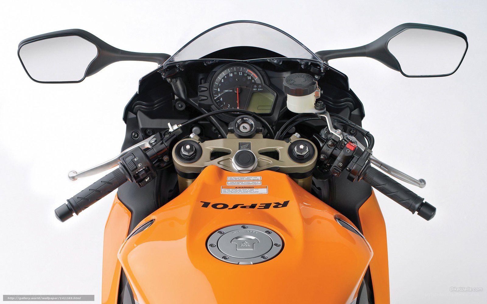 Orange Honda motorcycle cockpit