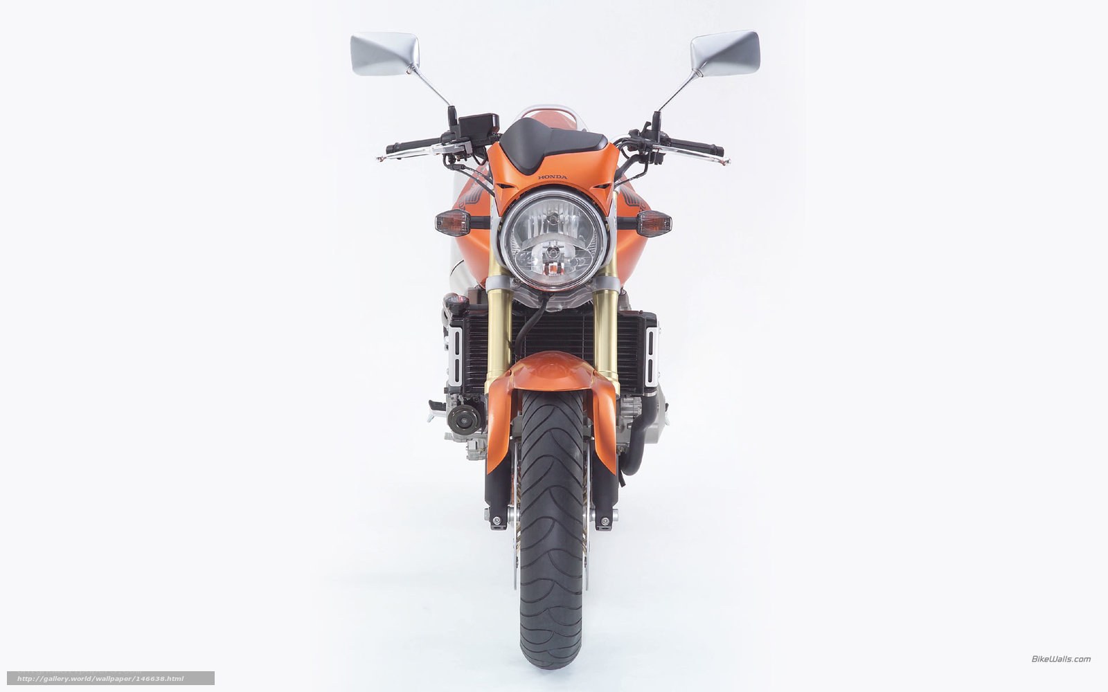 orange Honda motorcycle front view