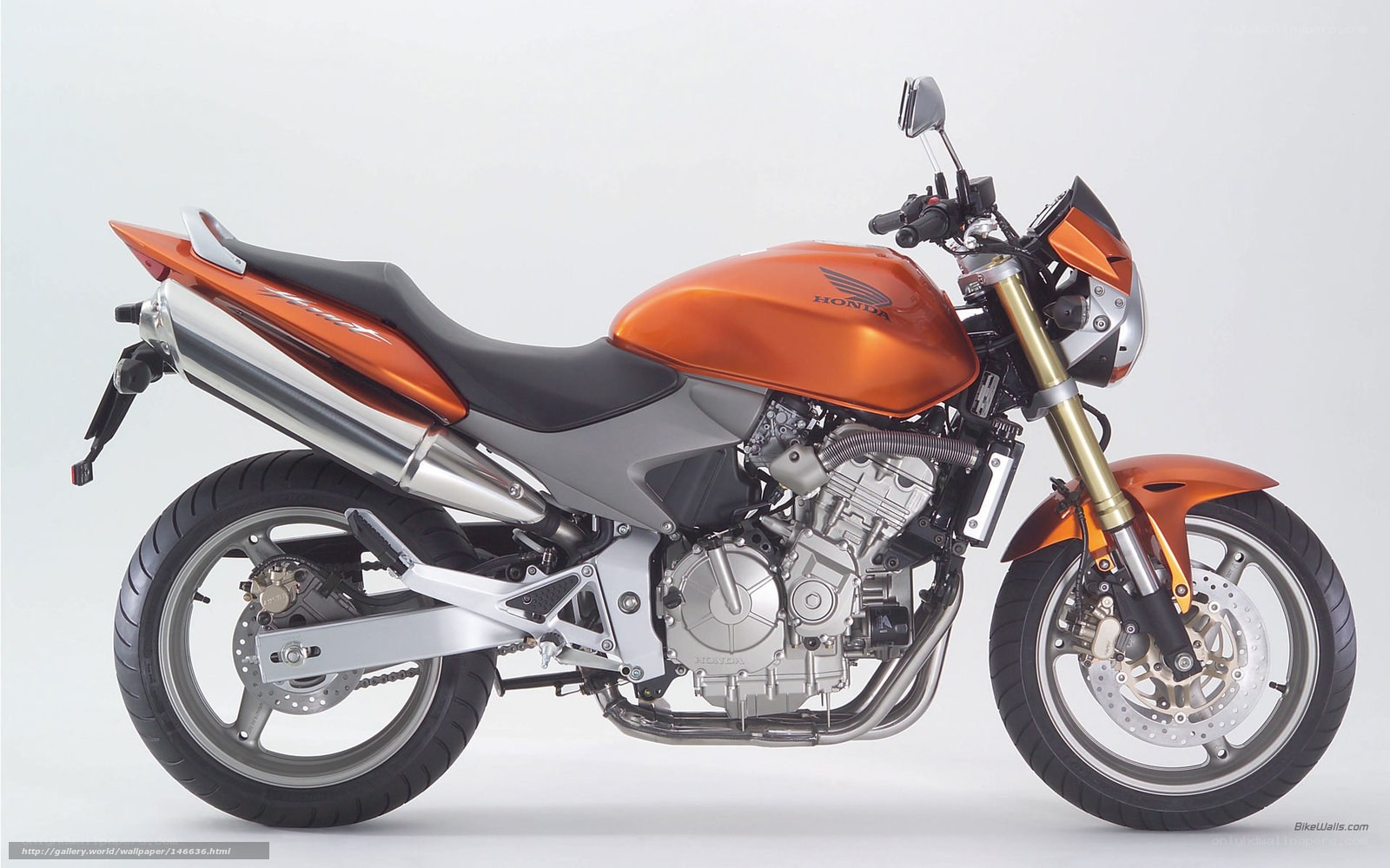 orange honda motorcycle
