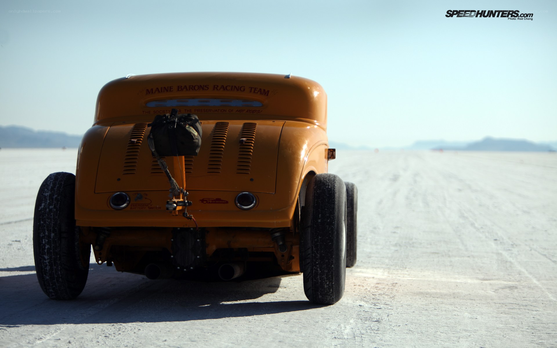 Orange hot rod on salt flat