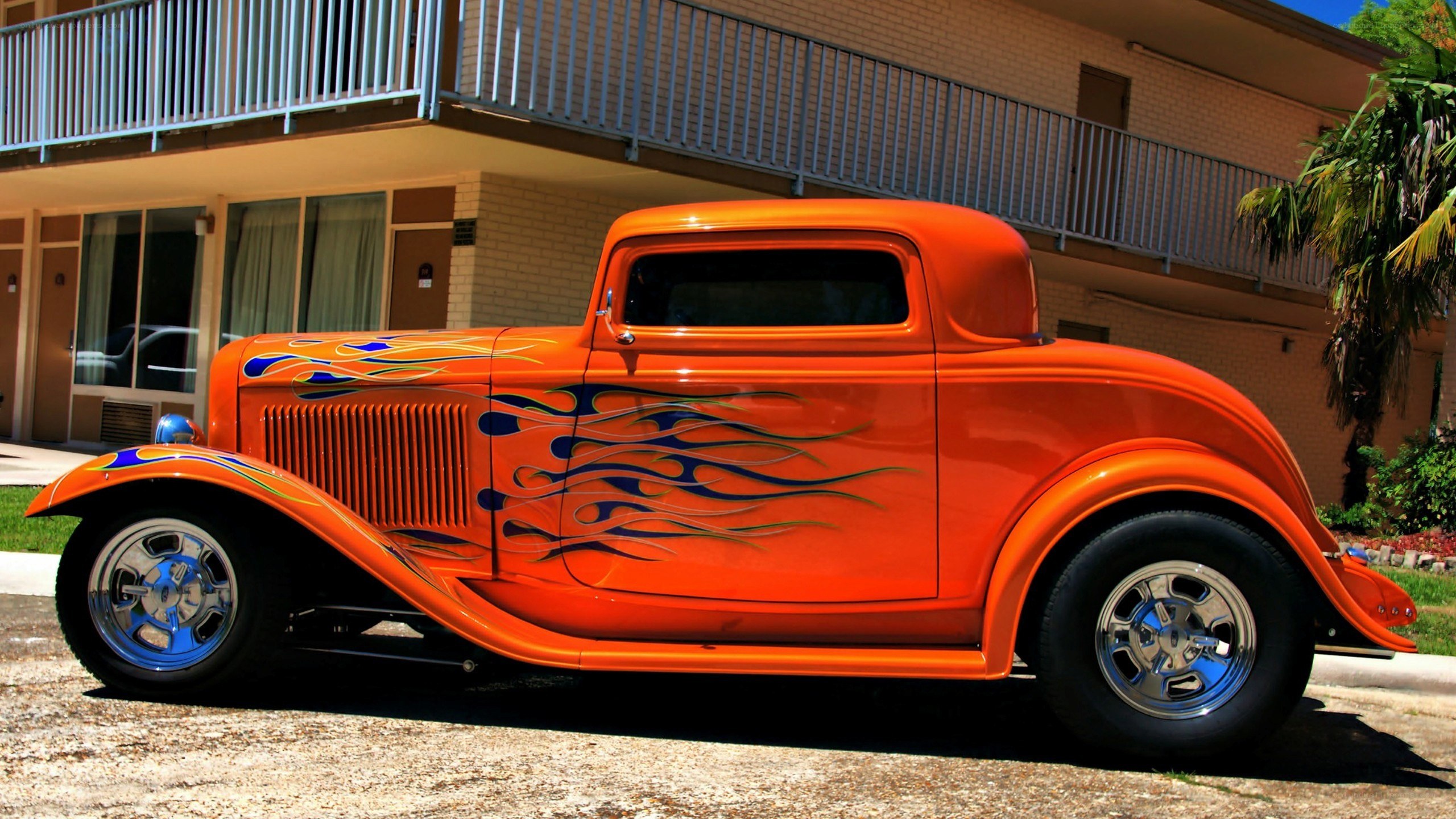 orange hot rod with flames