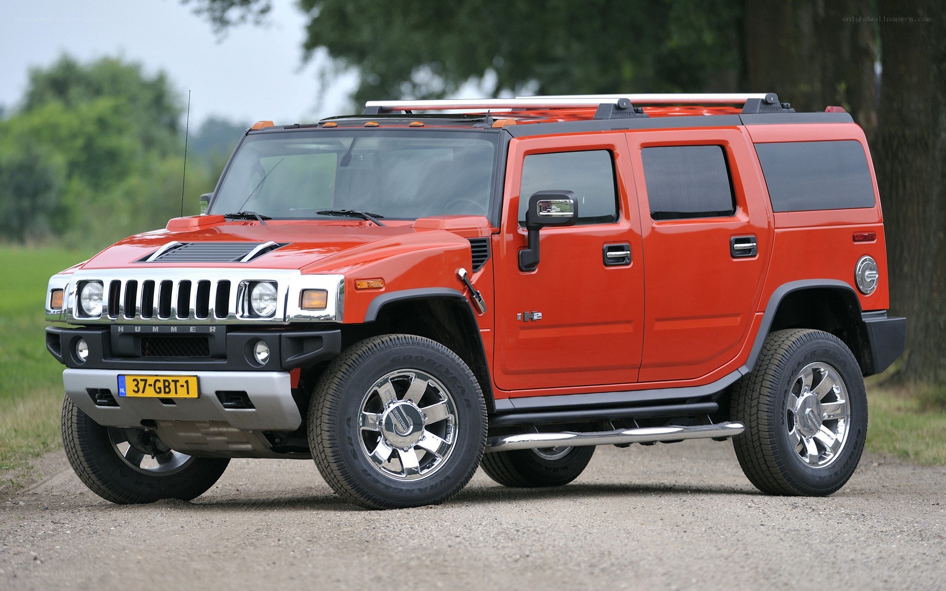 Orange Hummer H2 SUV