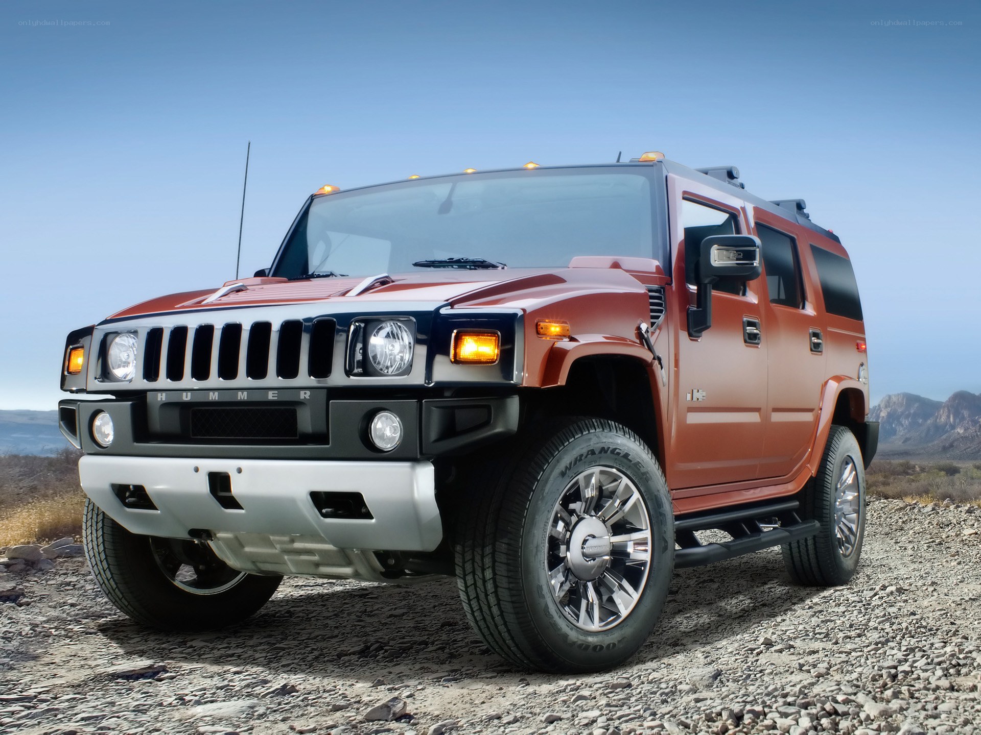 Orange Hummer H2 SUV