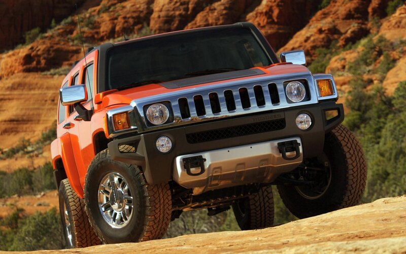 Orange Hummer H3 — Dramatic, Afternoon, Photograph, Rocky Terrain, Mountain