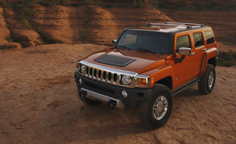 Orange Hummer H3 — Dramatic, Sunset, Photograph, Rocky Terrain