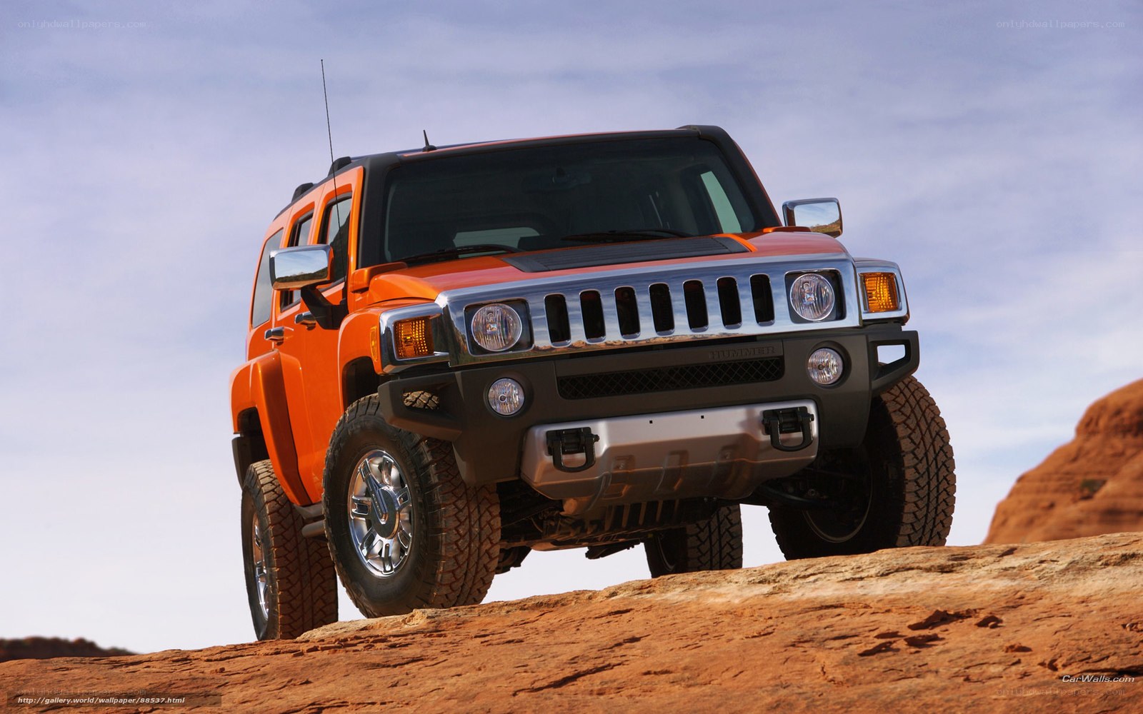 Orange Hummer H3 off-road