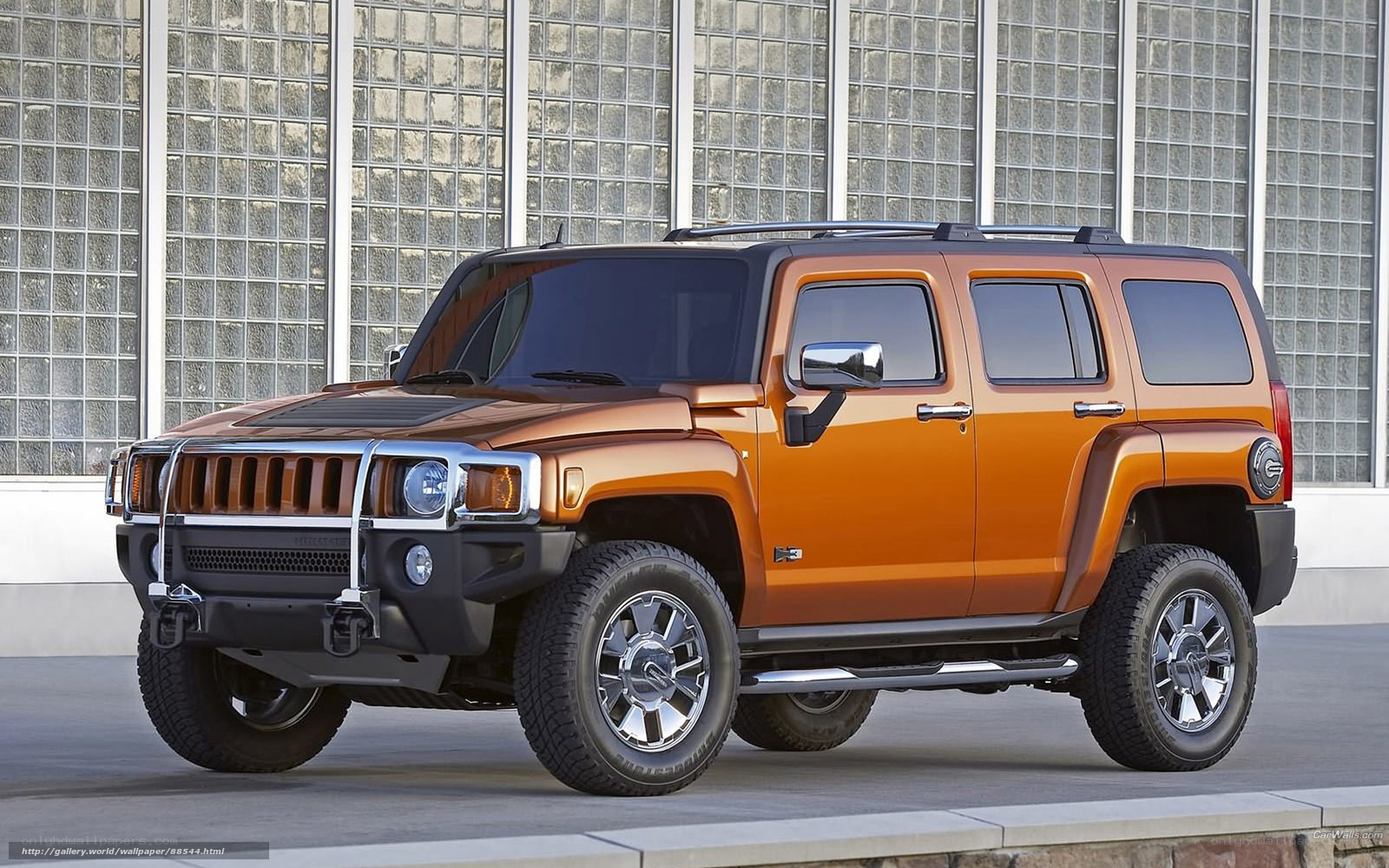 Orange Hummer H3 SUV
