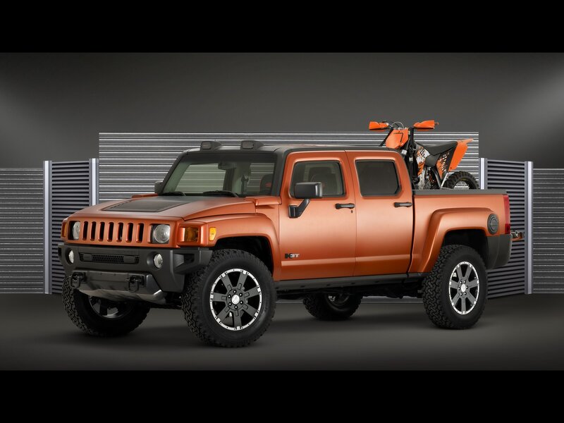 Orange Hummer H3T pickup truck