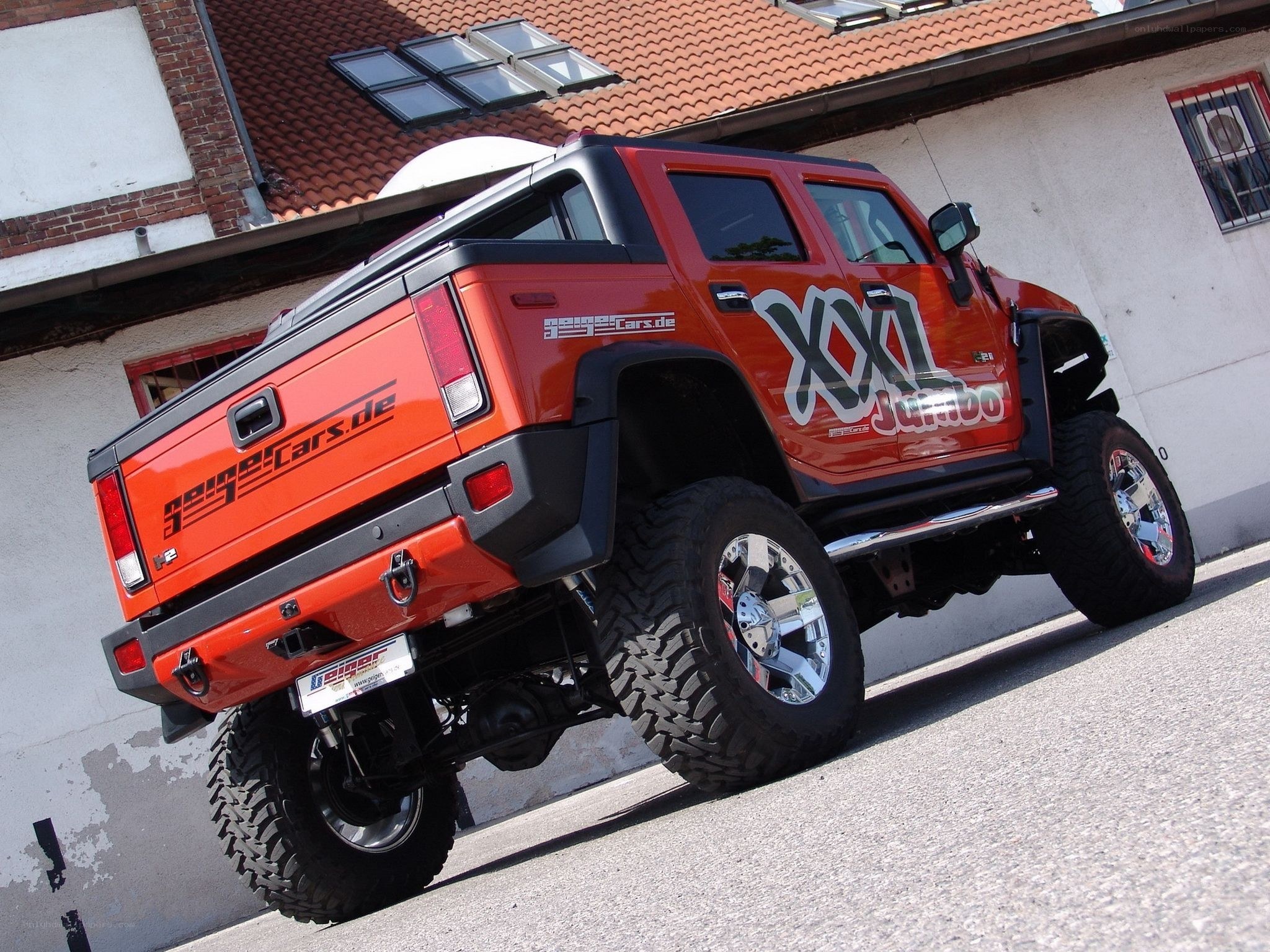 orange hummer pickup truck